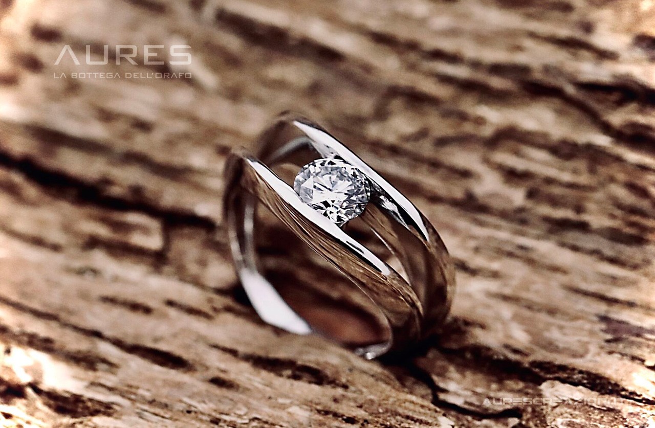 anello-solitario-curve-diamante-oro-bianco-brillante.jpg